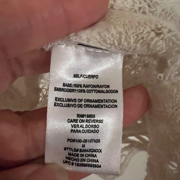 Lace embroidered top, with bell sleeves. Sleeves have side slits. EUC - Picture 7 of 9